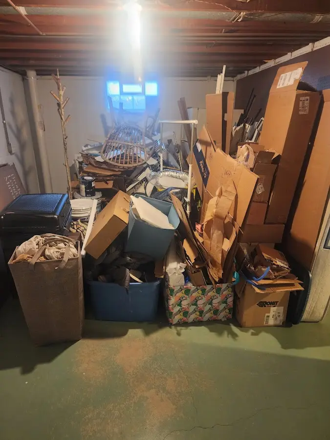 Roll-off dumpster container at job site for 4 Yard Dumpster Rental in Clarksburg